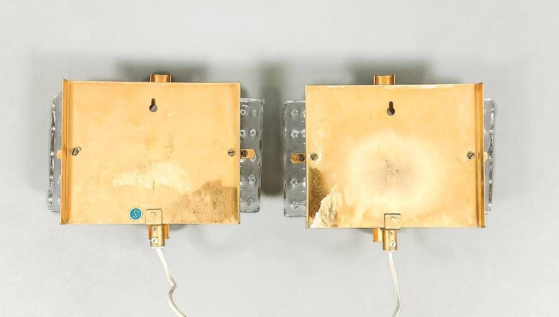 HANS AGNE JAKOBSSON. A pair of glass and brass wall lights