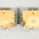 HANS AGNE JAKOBSSON. A pair of glass and brass wall lights