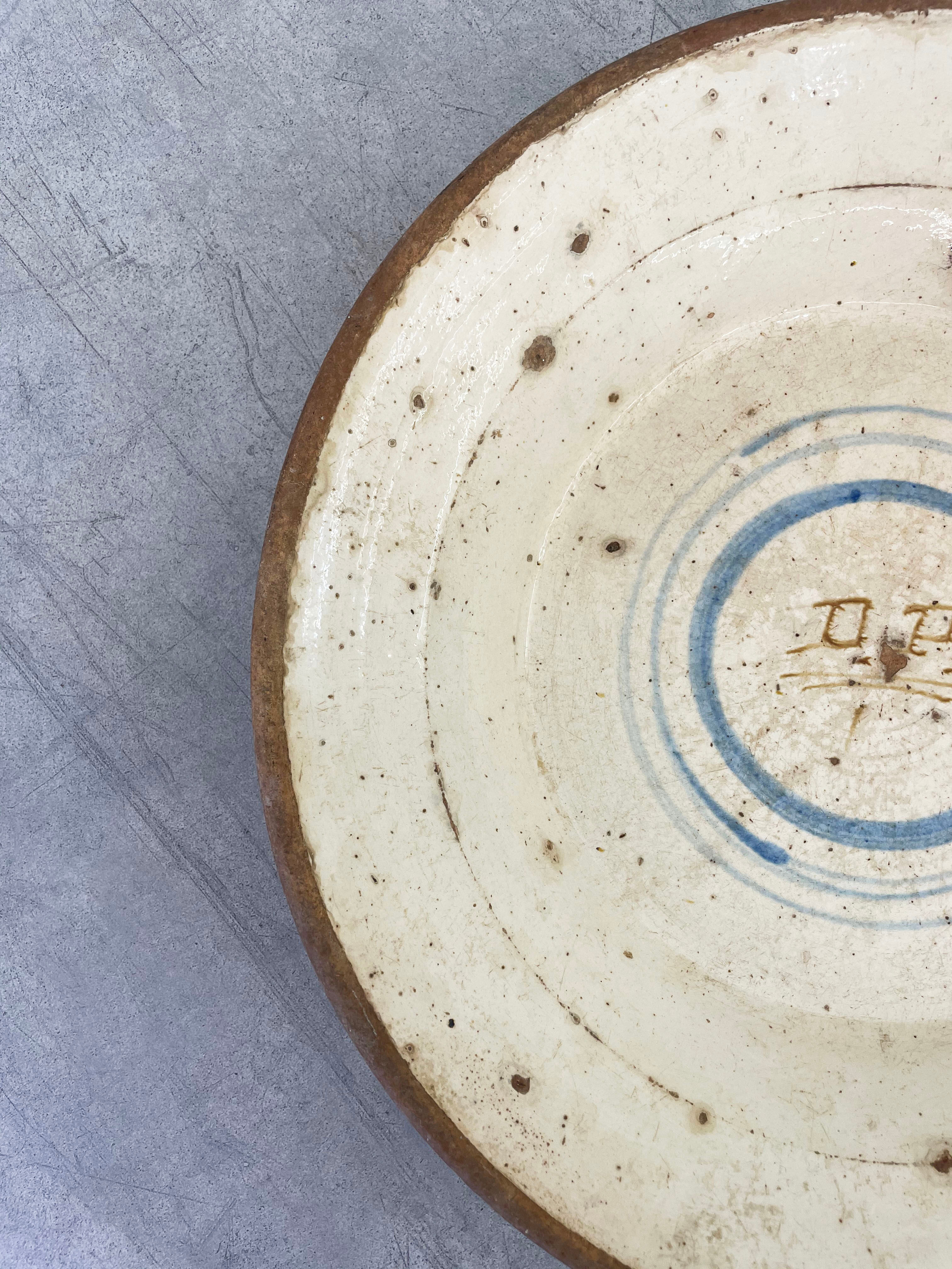 Initialled terracotta bowl