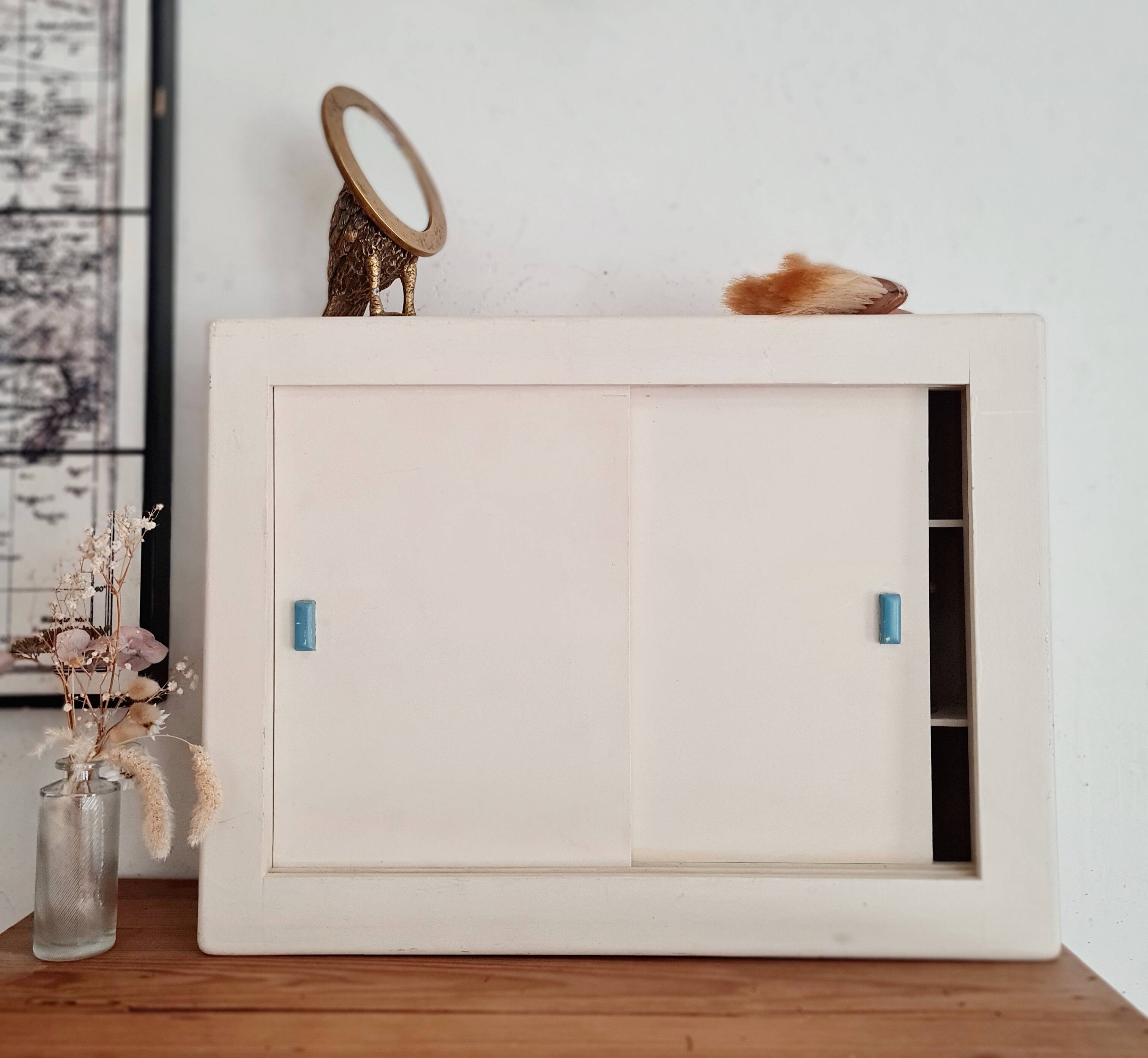 Old white medicine cabinet