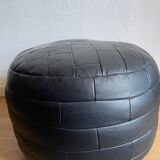 Black patchwork leather pouf from Sède