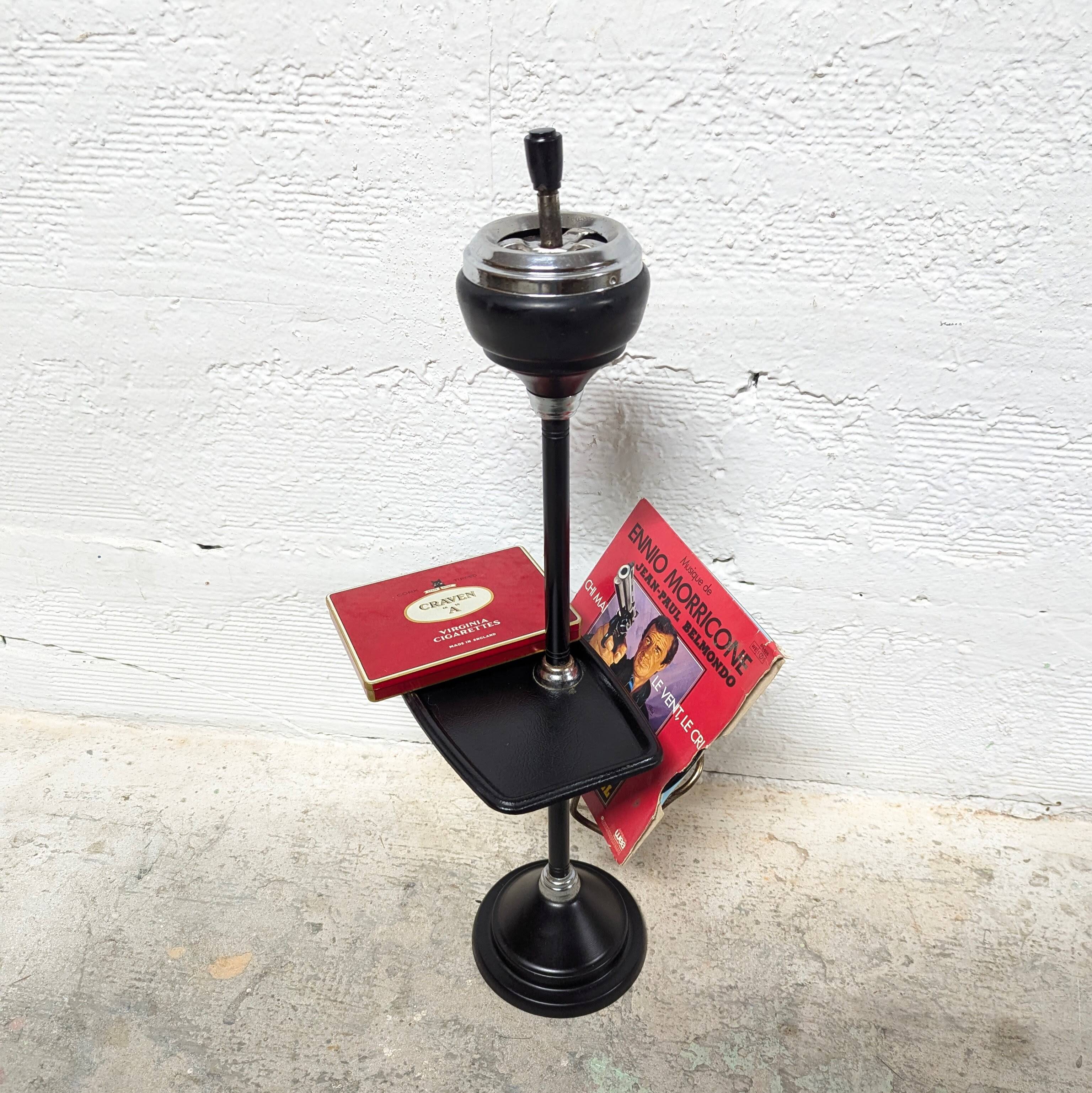 Standing ashtray with magazine rack