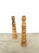 Pair of turned wooden candlesticks, raw and waxed.