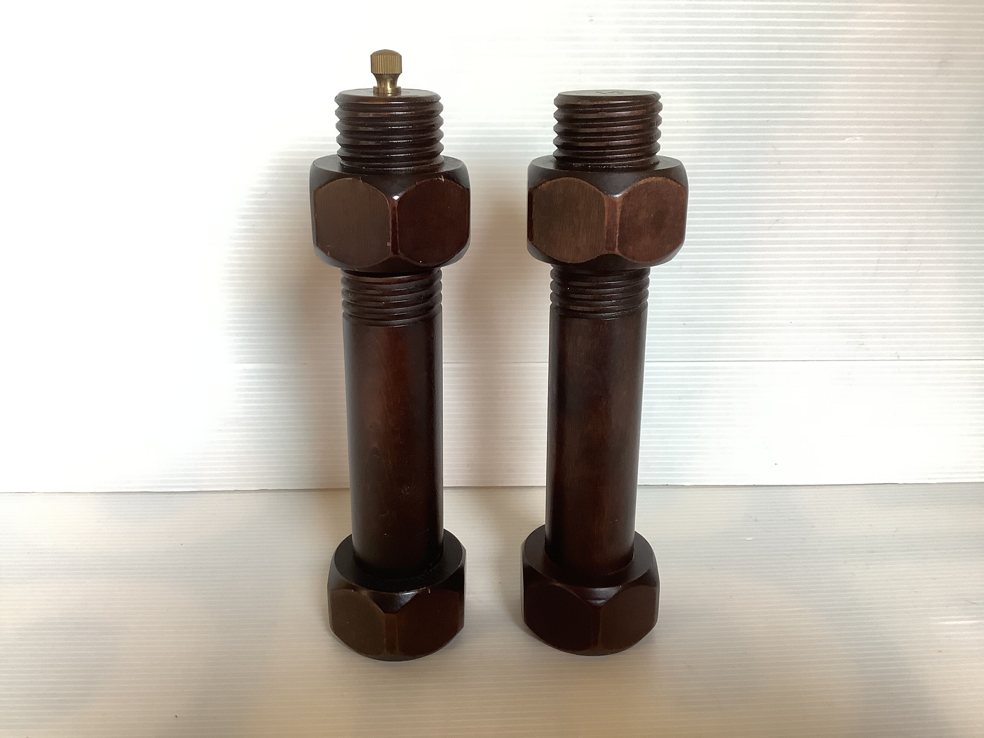 Wooden salt shaker and pepper screw-shaped nut salt and brutalist pepper