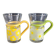 Pair of glass teacups with plastic handles