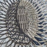 flat basket cut center table in woven metal