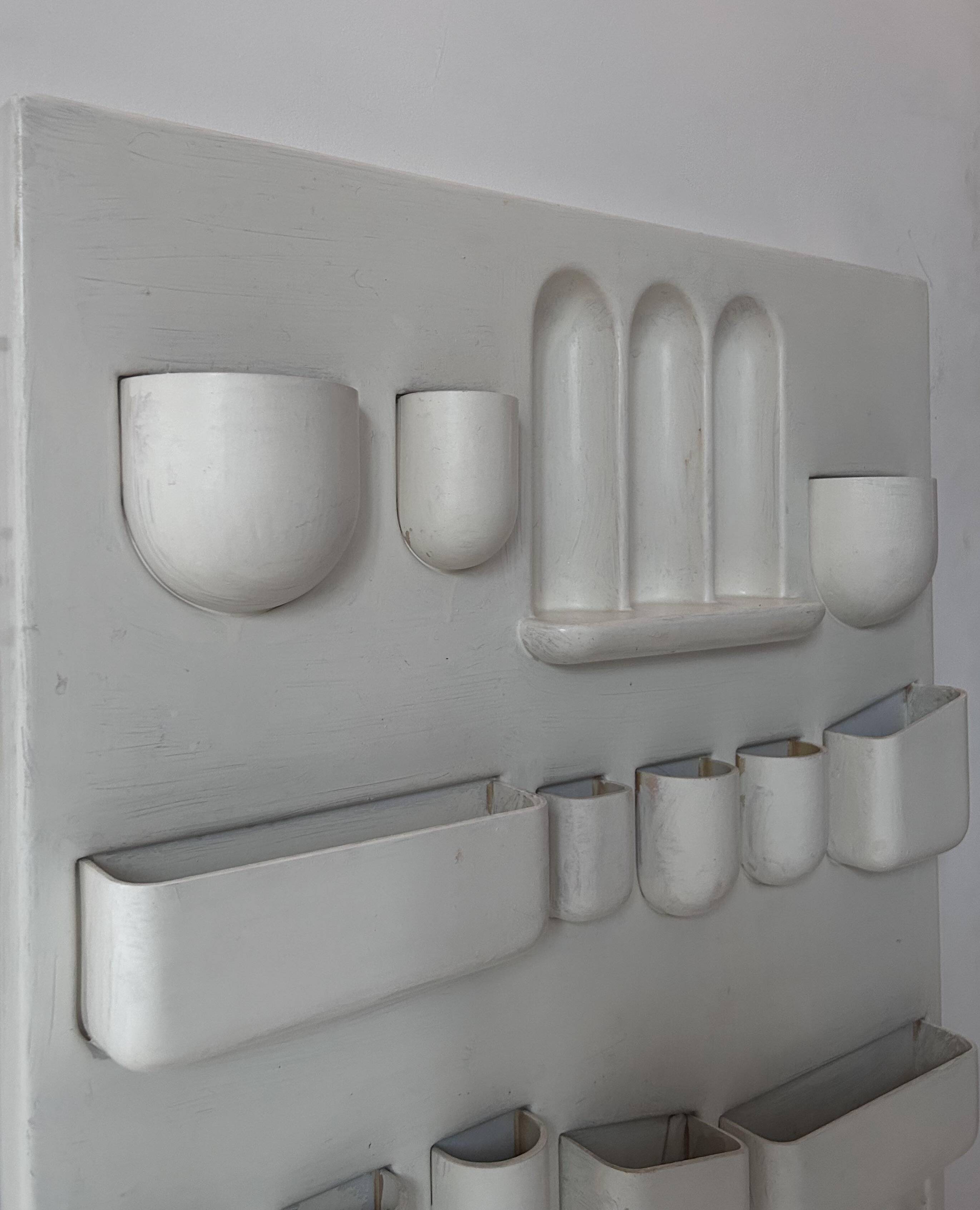 Vintage wall storage system in matte white ABS, Italy 1970s.