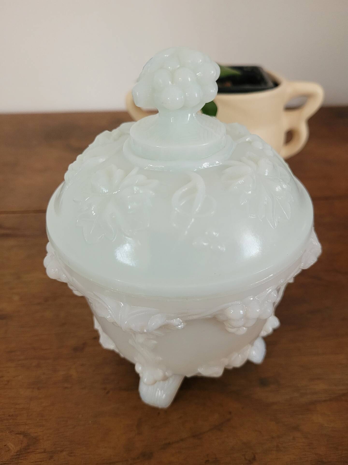 White opaline bonbonnière with floral decoration