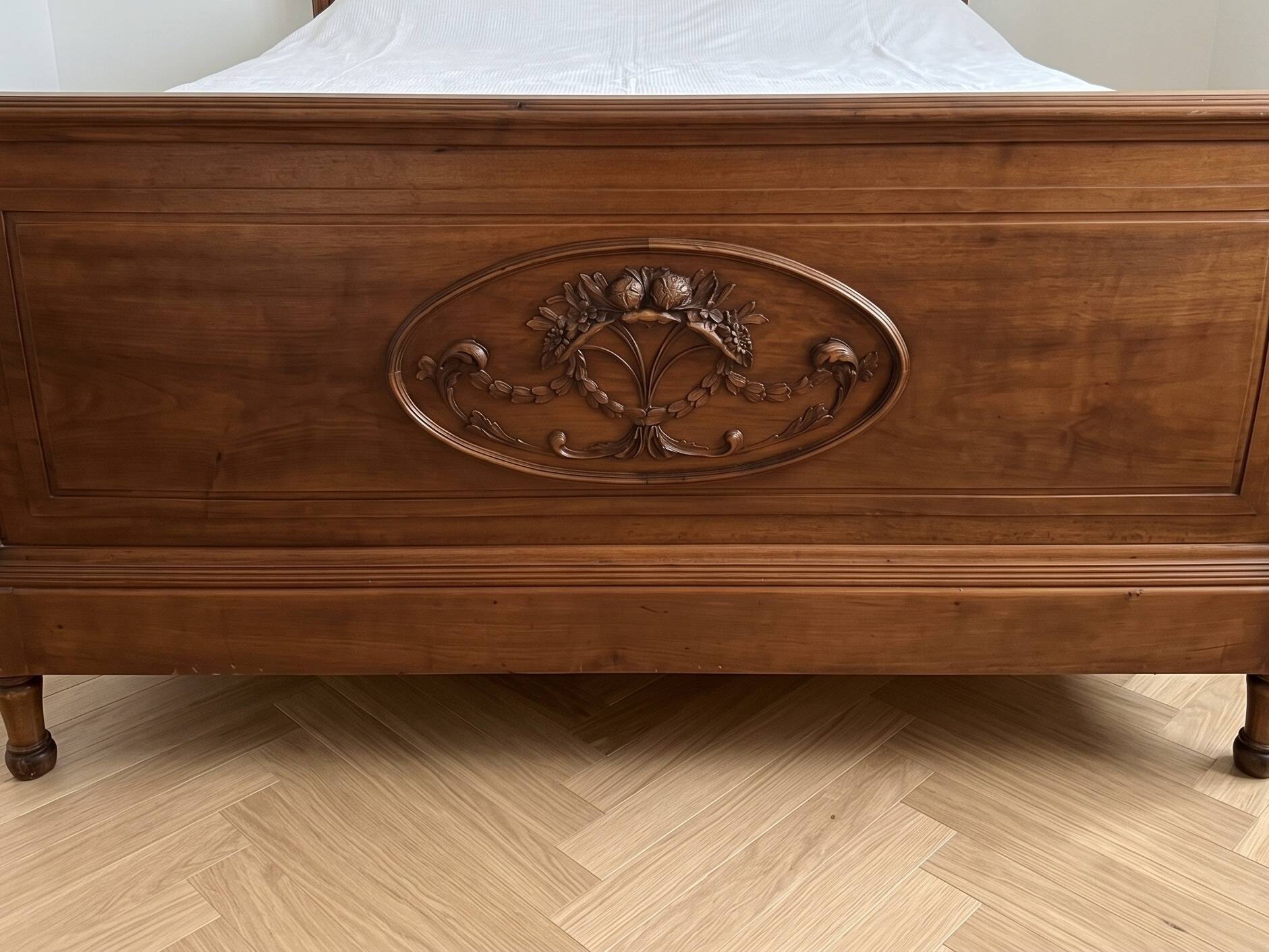 Antique carved wooden double bed