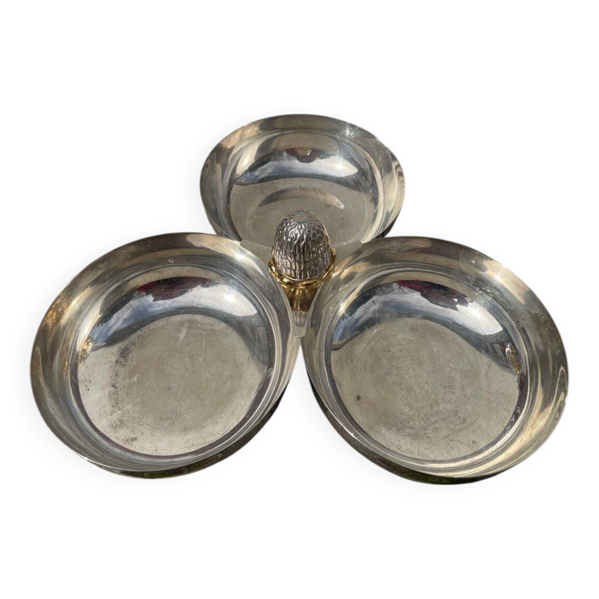 Silver-plated metal dish topped with an acorn