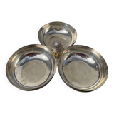 Silver-plated metal dish topped with an acorn