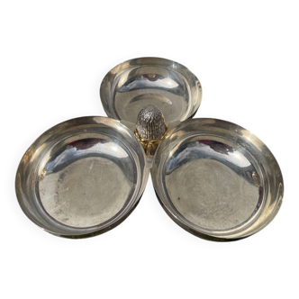 Silver-plated metal dish topped with an acorn