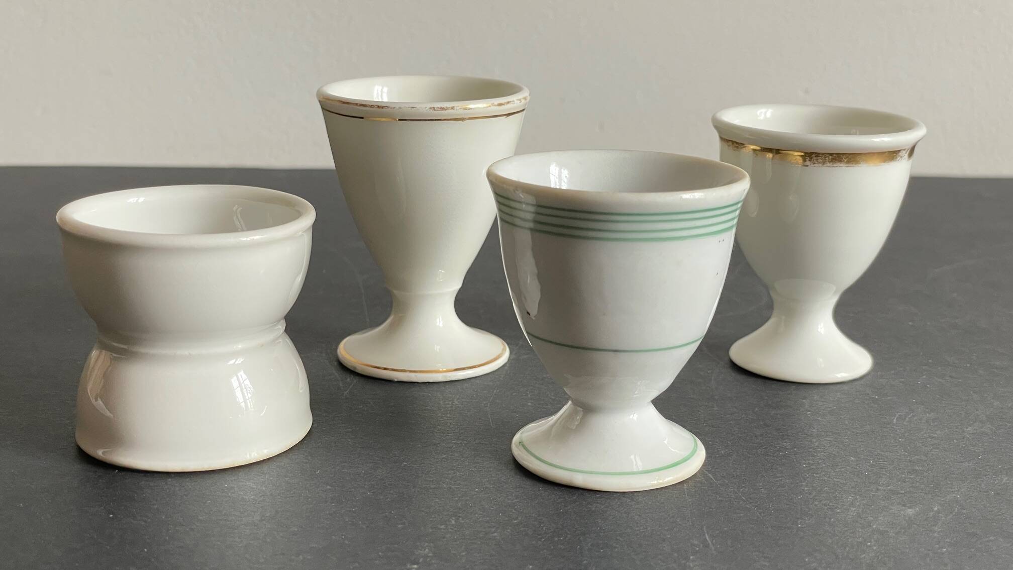 4 antique ceramic egg cups