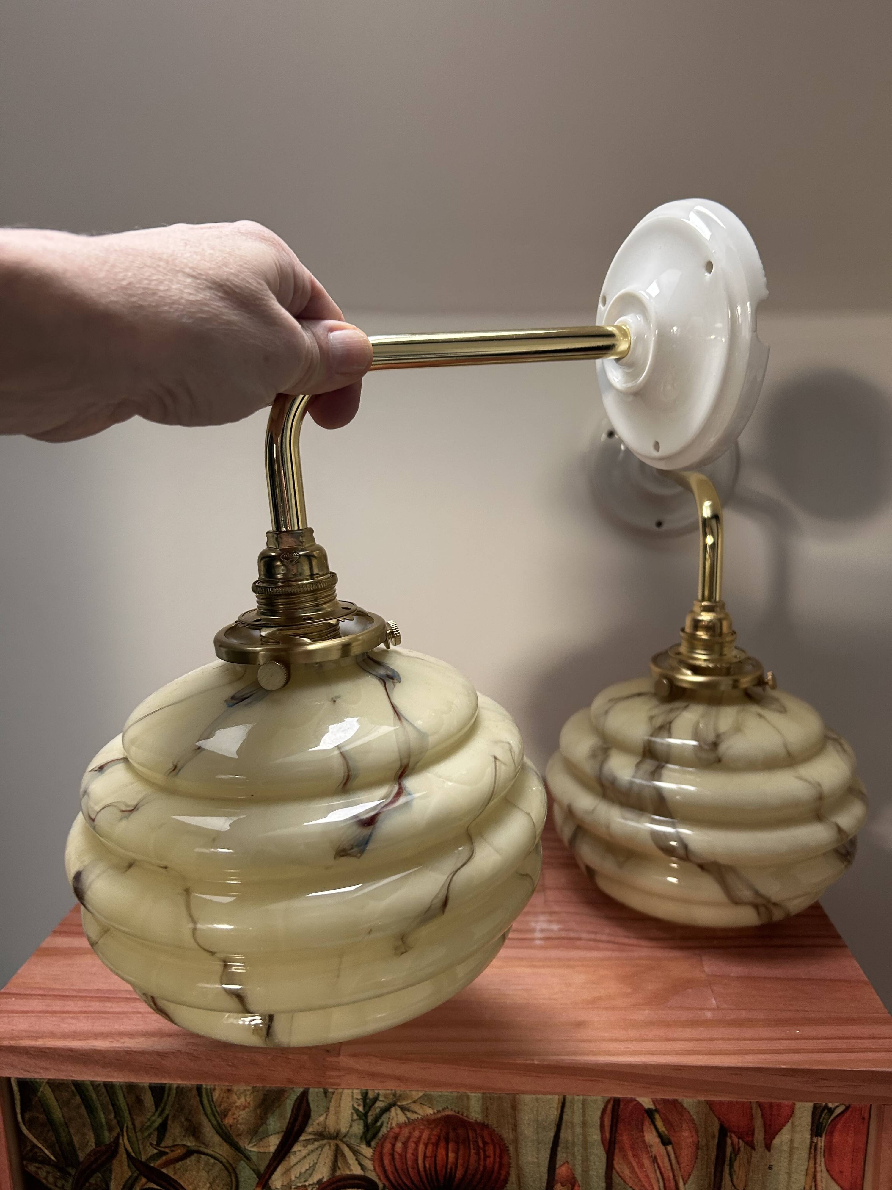 Pair of vintage marbled opaline globe wall lights
