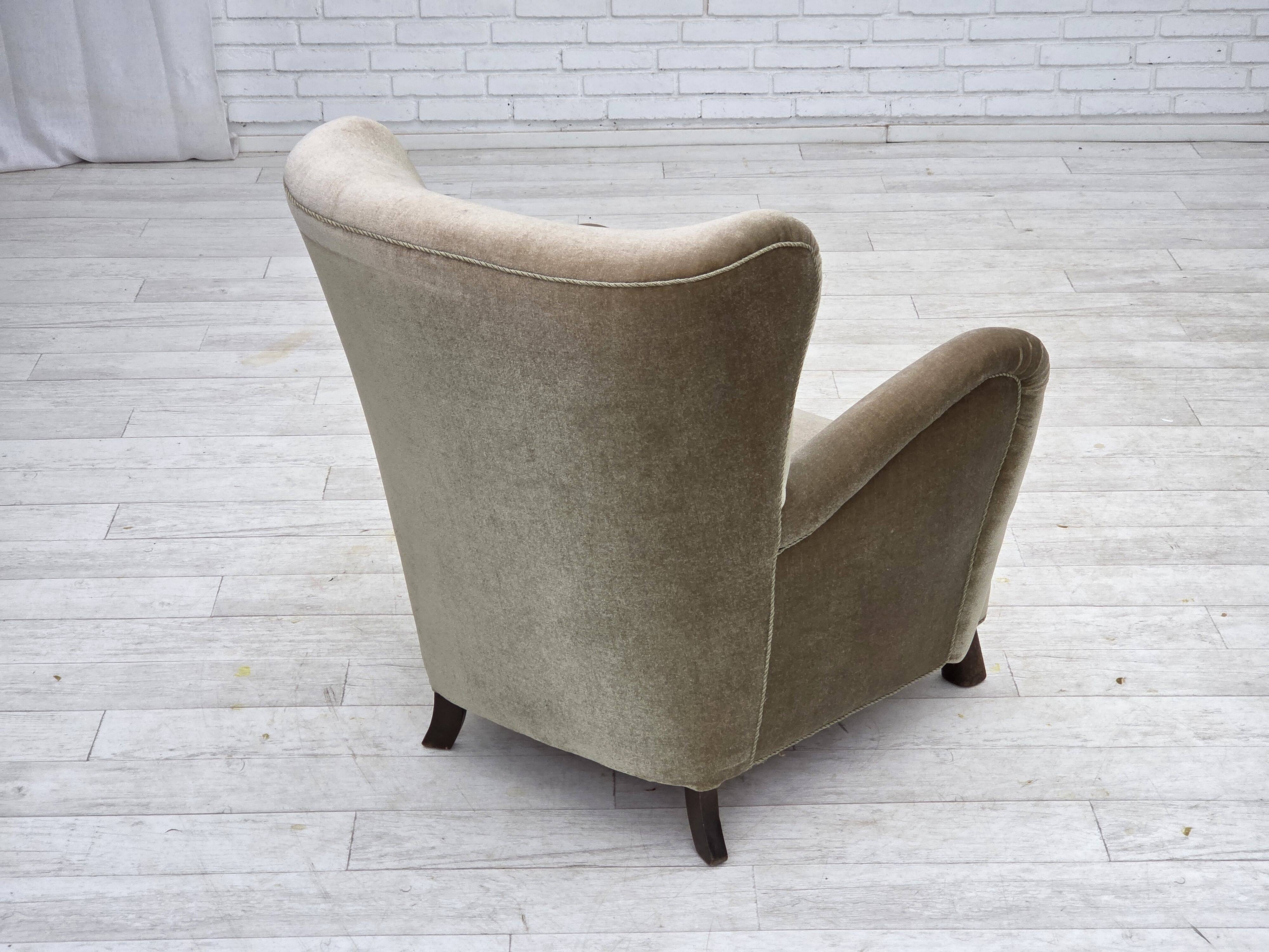 1960s, Danish armchair, green furniture velour, oak wood legs.