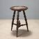 Side table in Swiss pine with a black marble top - Italy 20th century