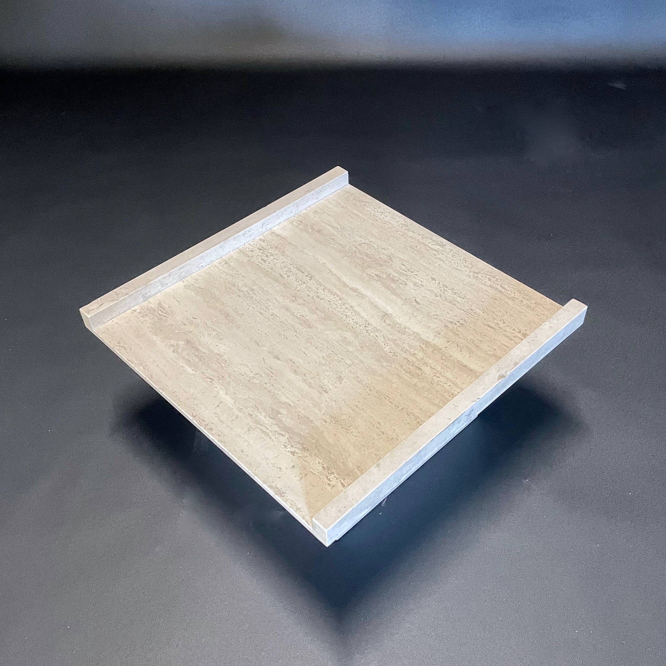 Square travertine coffee table by Claude Berraldacci. 1990s. France.