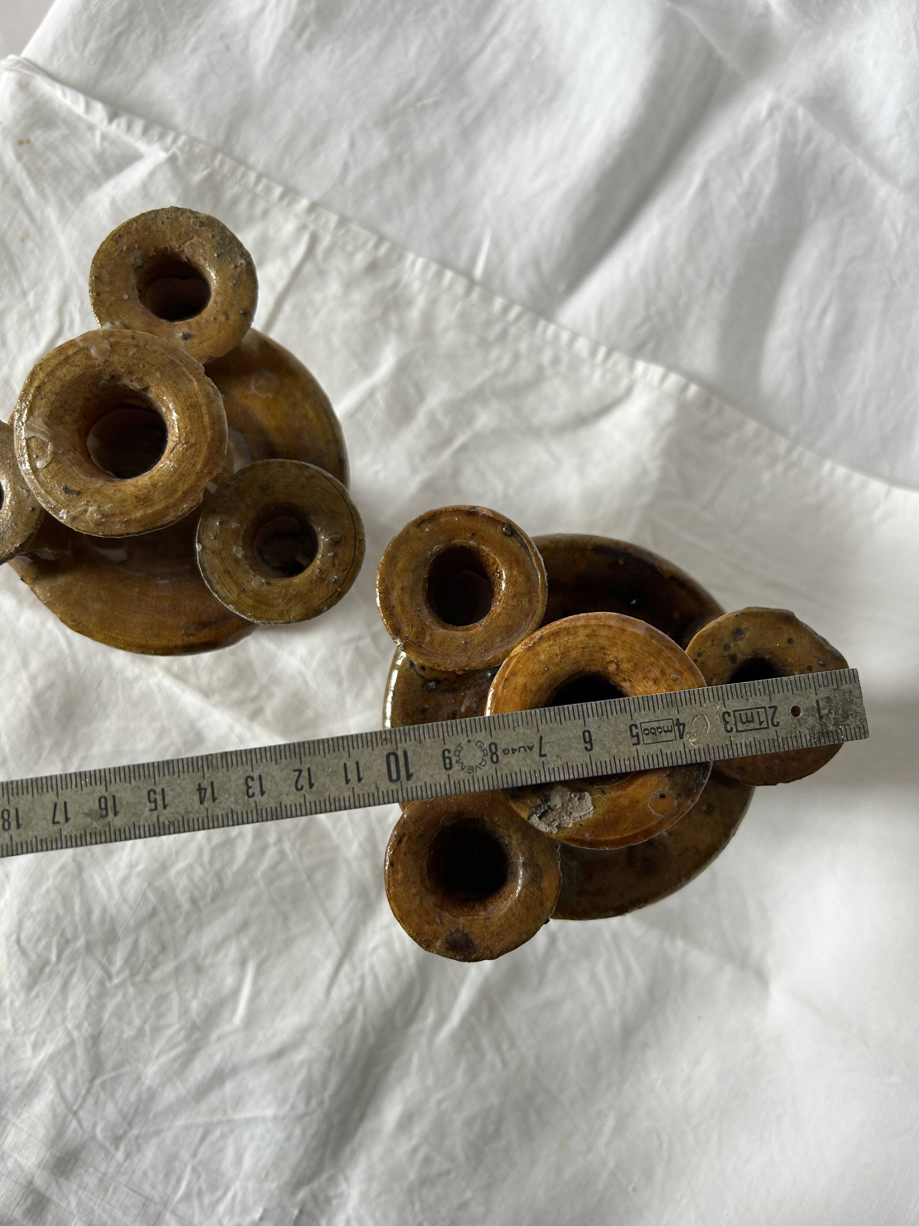 Set of two antique candlesticks