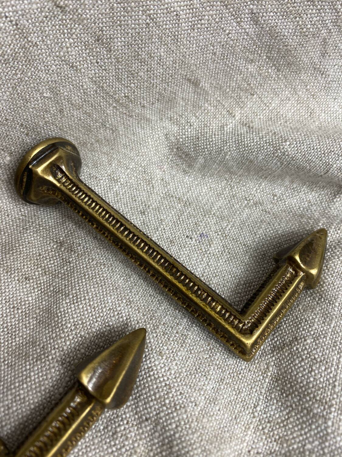 Antique brass curtain hooks and tiebacks