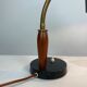 Table lamp of black metal and teak of Danish design, 1960s