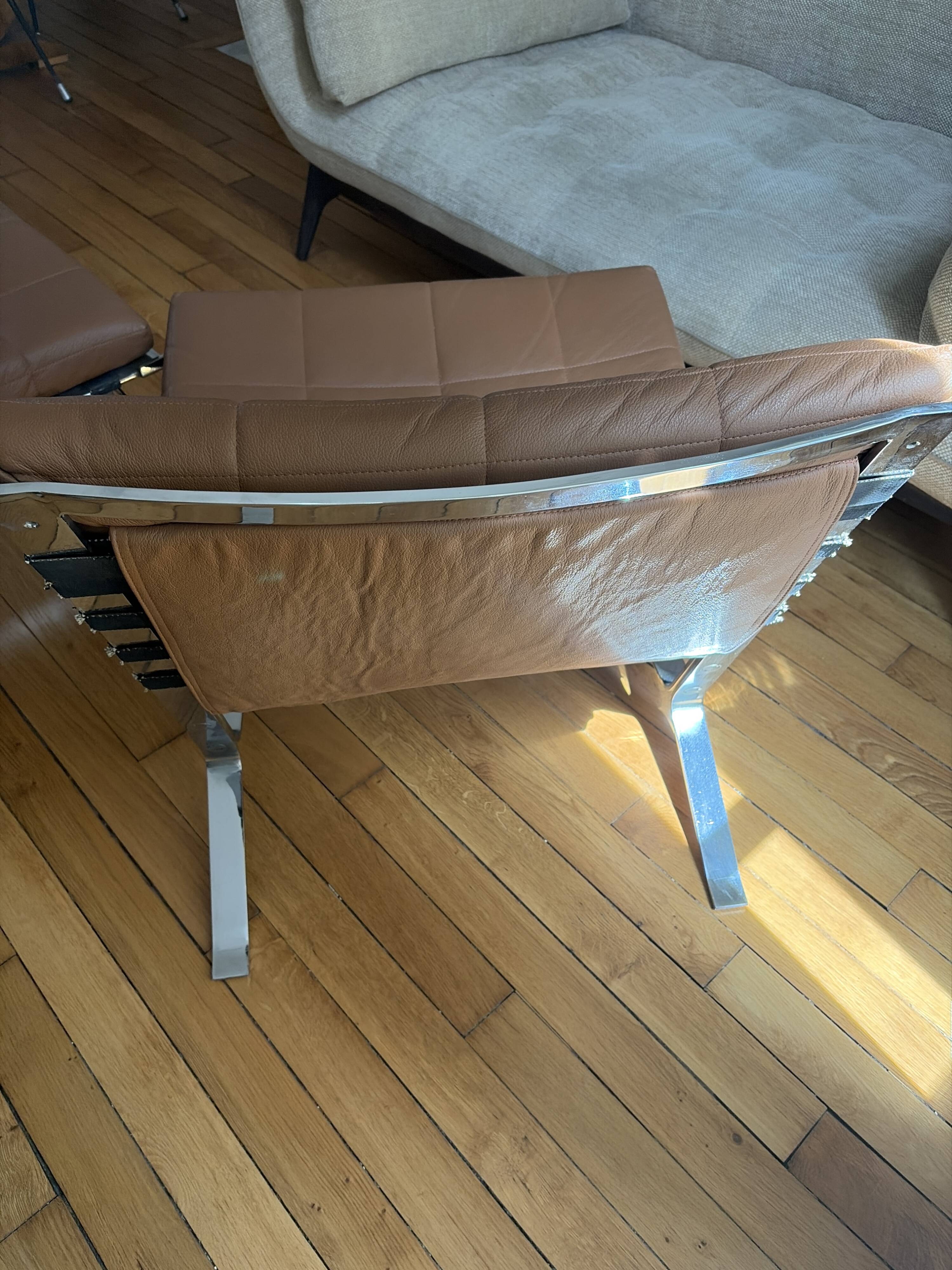 Armchairs and footrests by Olivier Mourgue