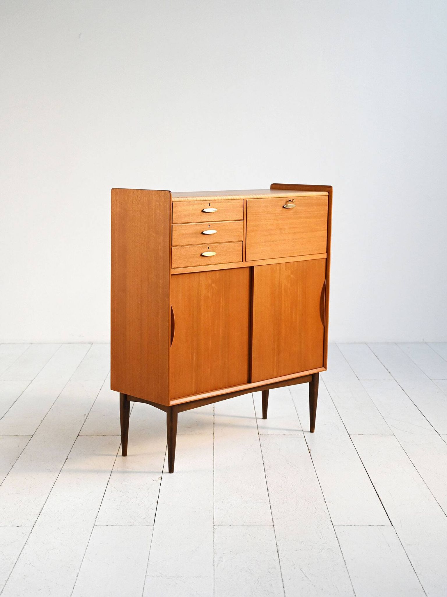 1950s Danish teak and brass cabinet