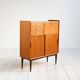 1950s Danish teak and brass cabinet