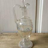 Antique decanter decorated by hand