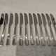 12 silver-plated dessert knives by Christofle Concorde, 19cm