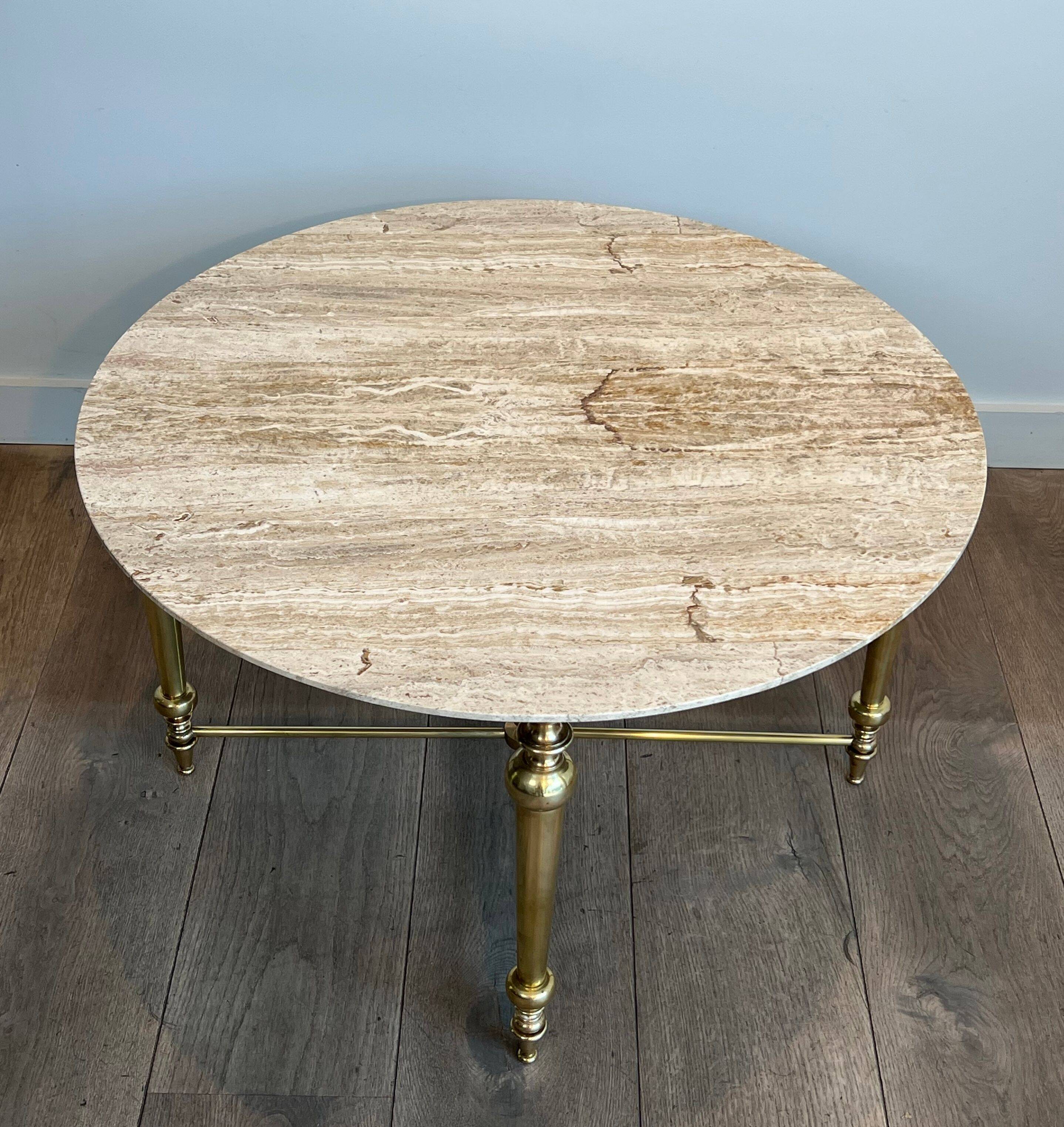 Brass coffee table with a white marble top.