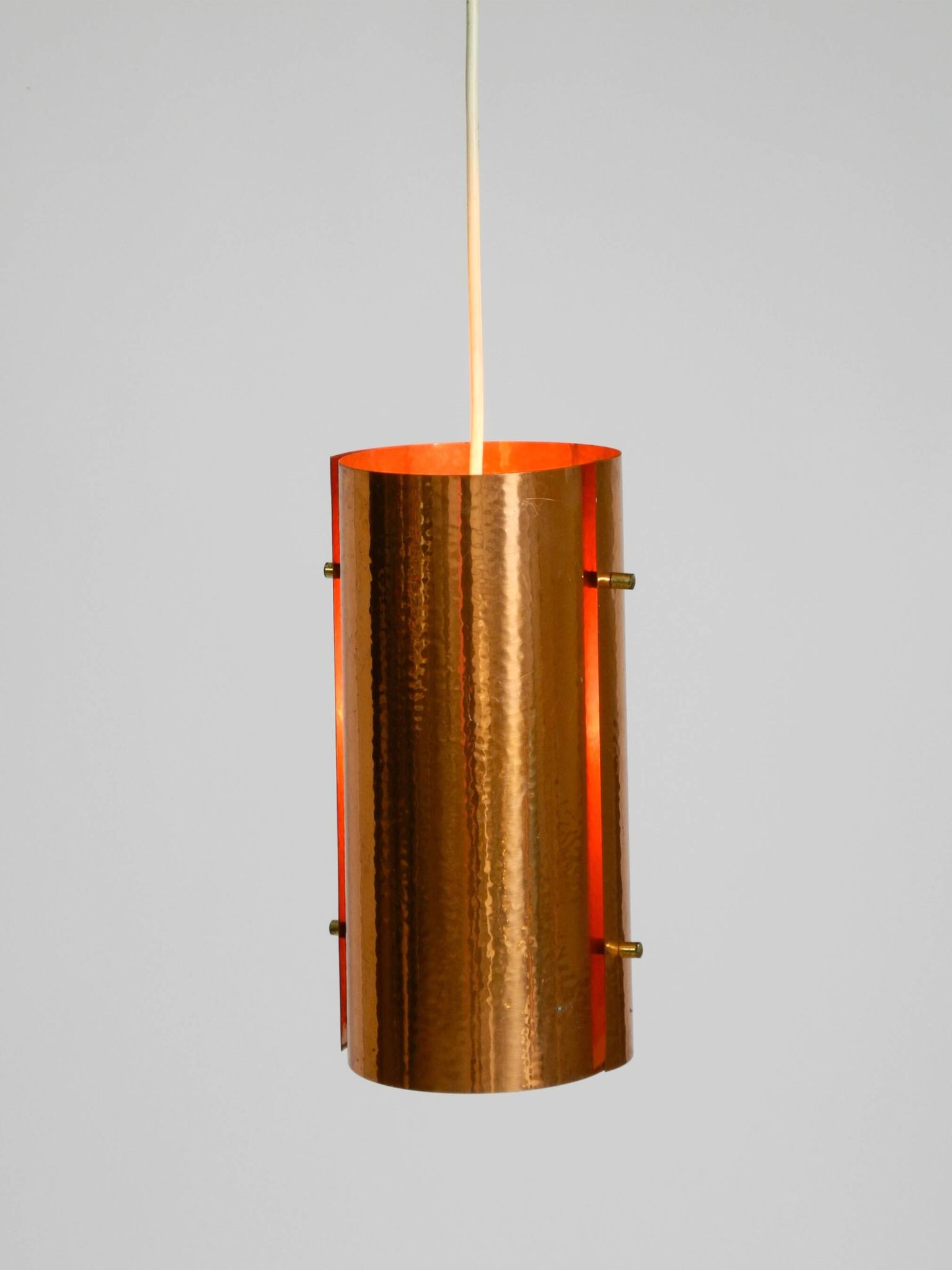 Two 50s tube pendant lamps consisting of two screwed-together copper bowls