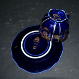 A precious, multi-lobed cup in German cobalt porcelain with a gold interior, Lindner Bavaria.