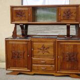 Solid walnut sideboard, moustache legs, black marble top.