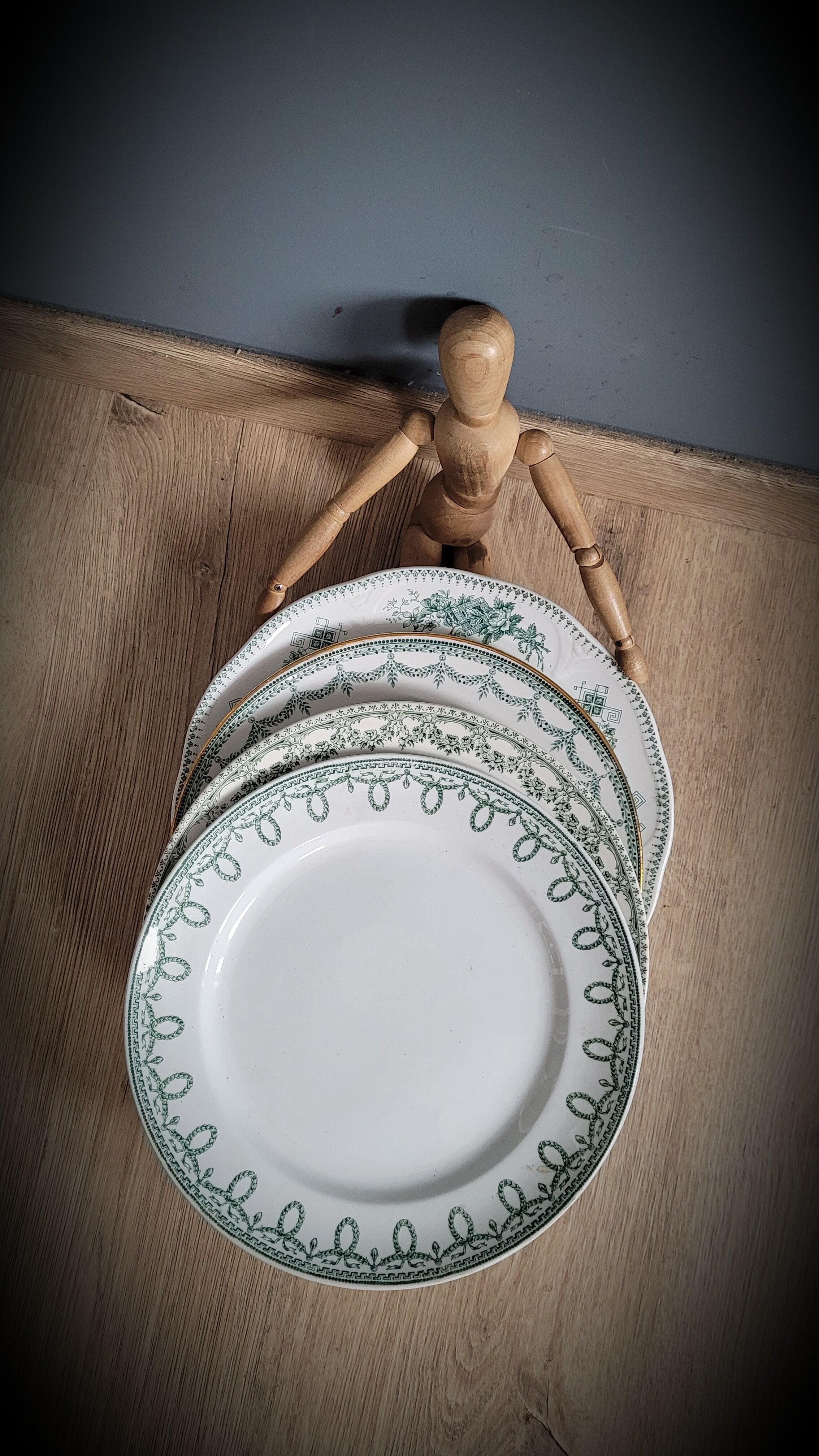 Set of 4 mismatched green plates