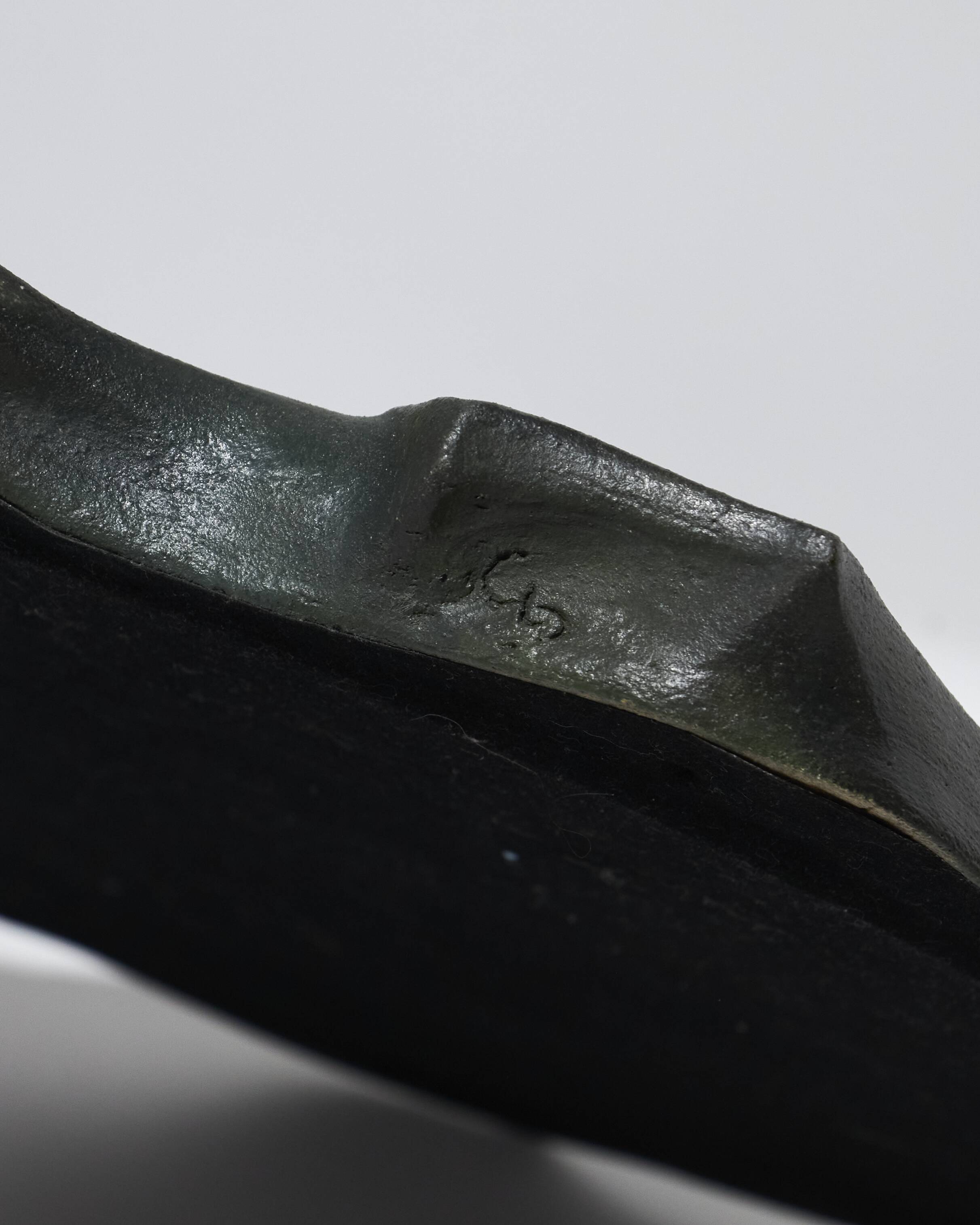 Sculptural sandstone mirror