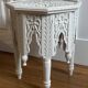 Oriental tea table or pedestal table forming a side table in solid carved and white lacquered wood