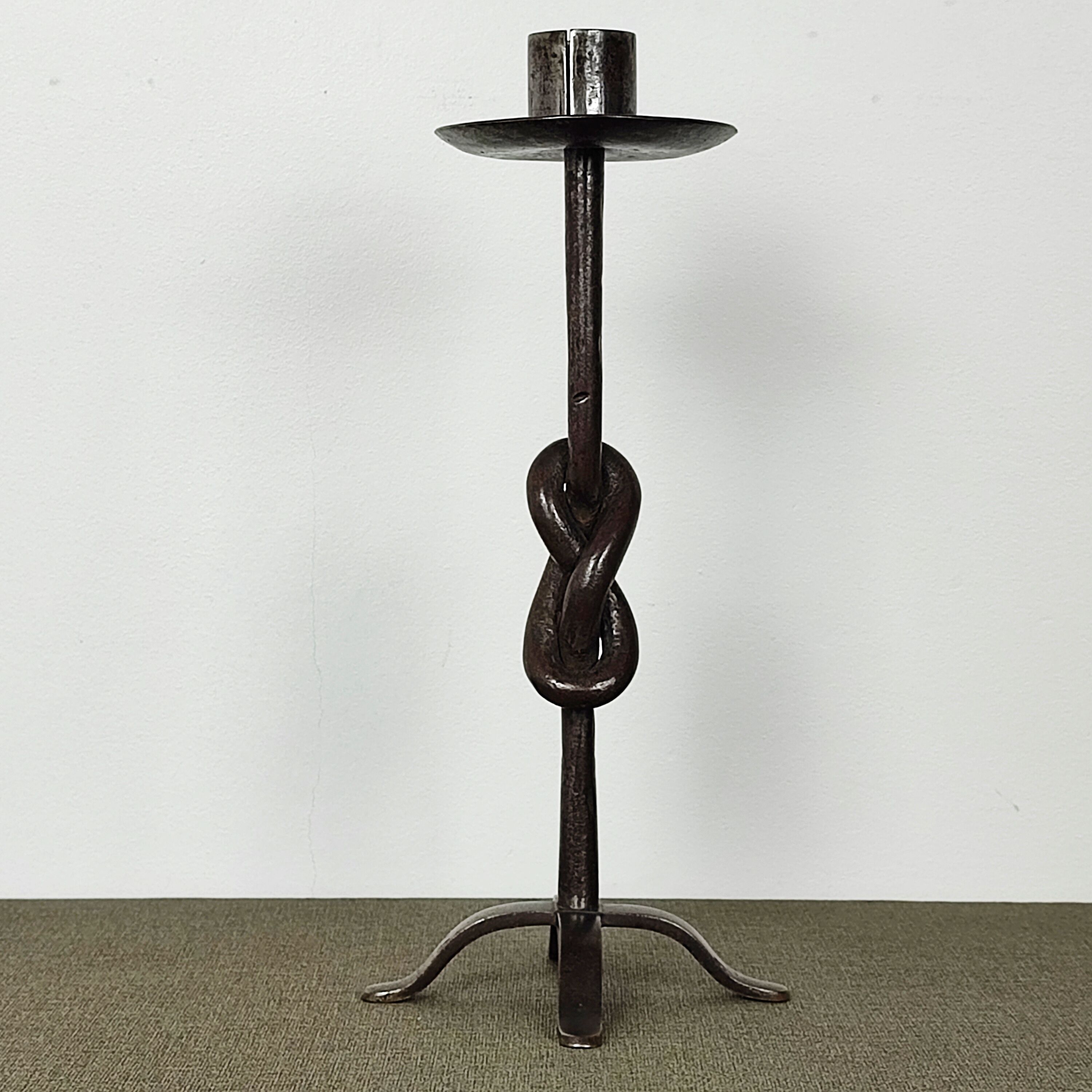 Wrought iron candle holder