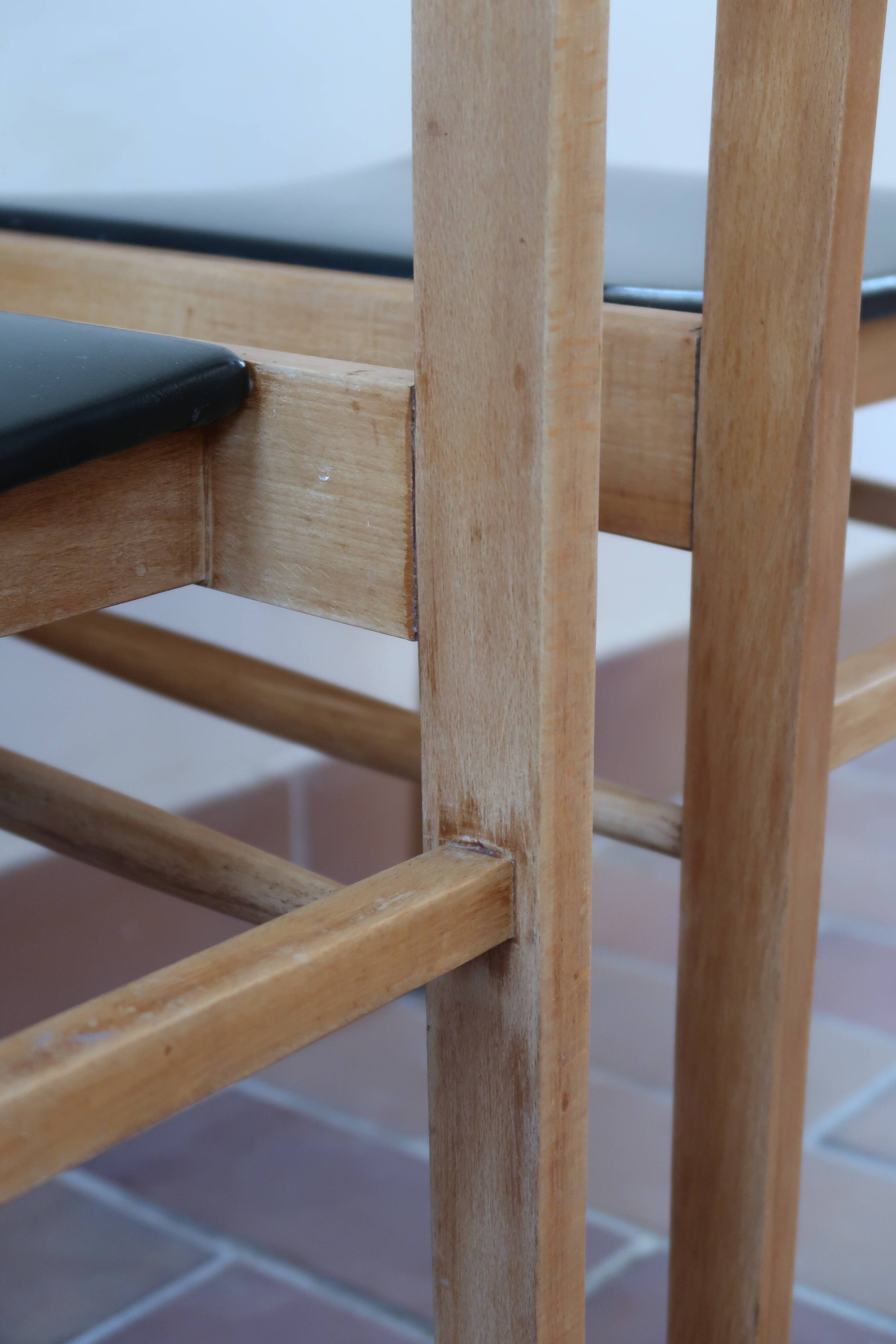 3 chaises scandinaves skaï noir