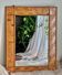 Italian mirror in woven rattan and sewn bamboo, 1970s