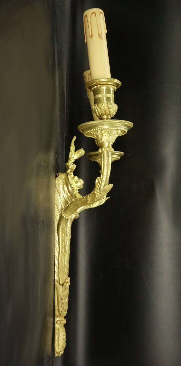Pair of large wall sconces with flowers in the Louis XVI style from the 19th century - gilded bronze.
