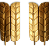 Applies in bronze "feathers"