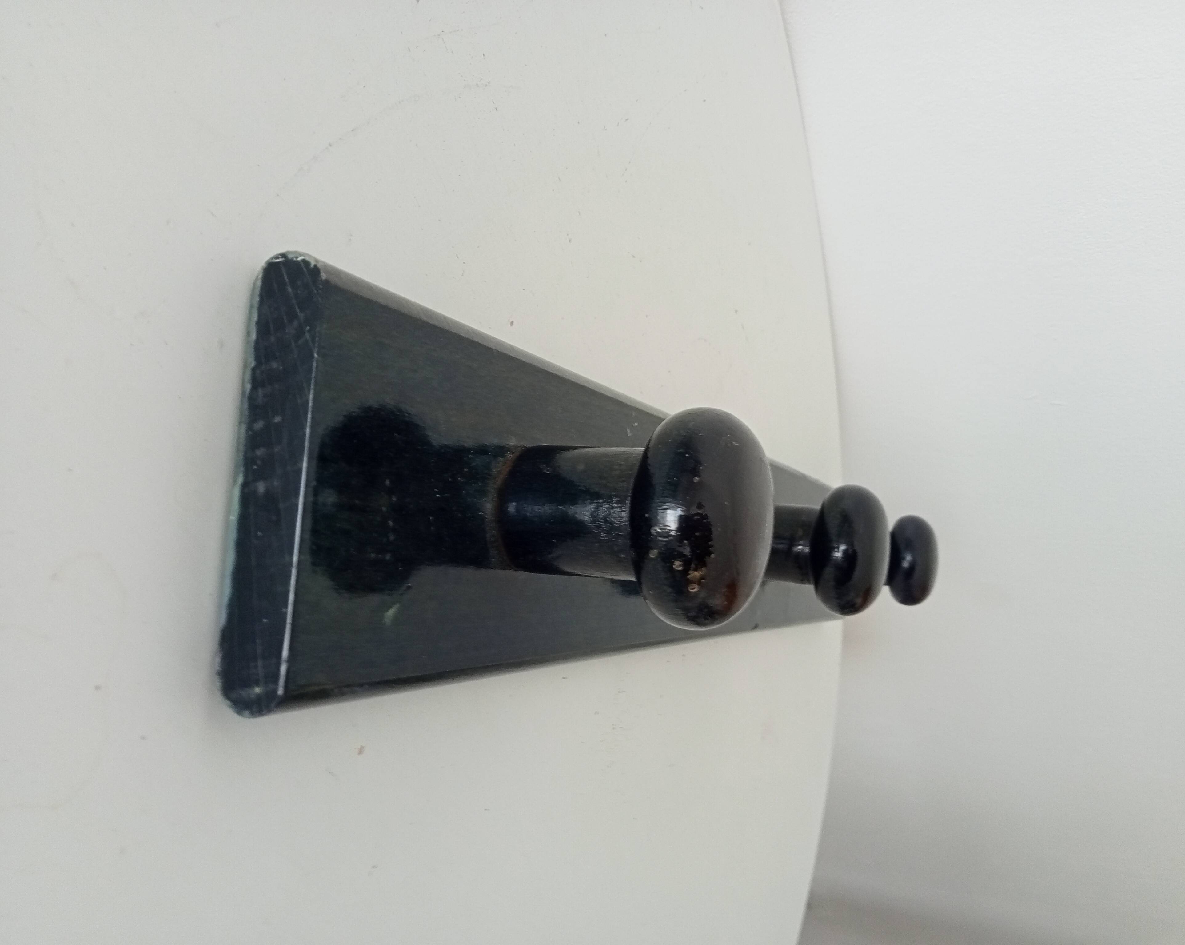 Vintage wall-mounted coat rack in lacquered wood from the 60s