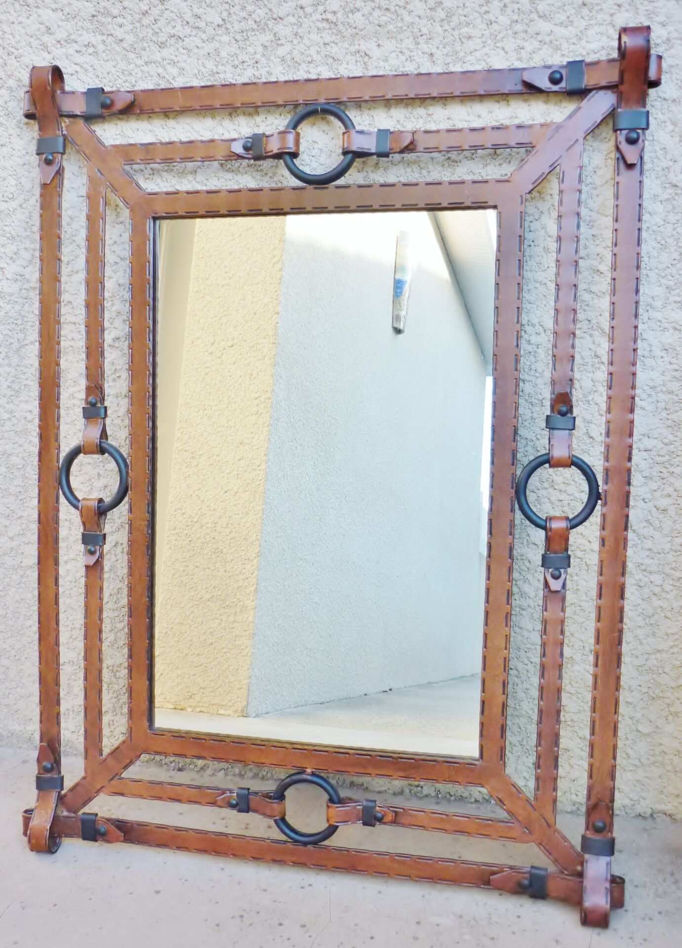 Metal mirror, wrought iron imitation leather straps and horse harness