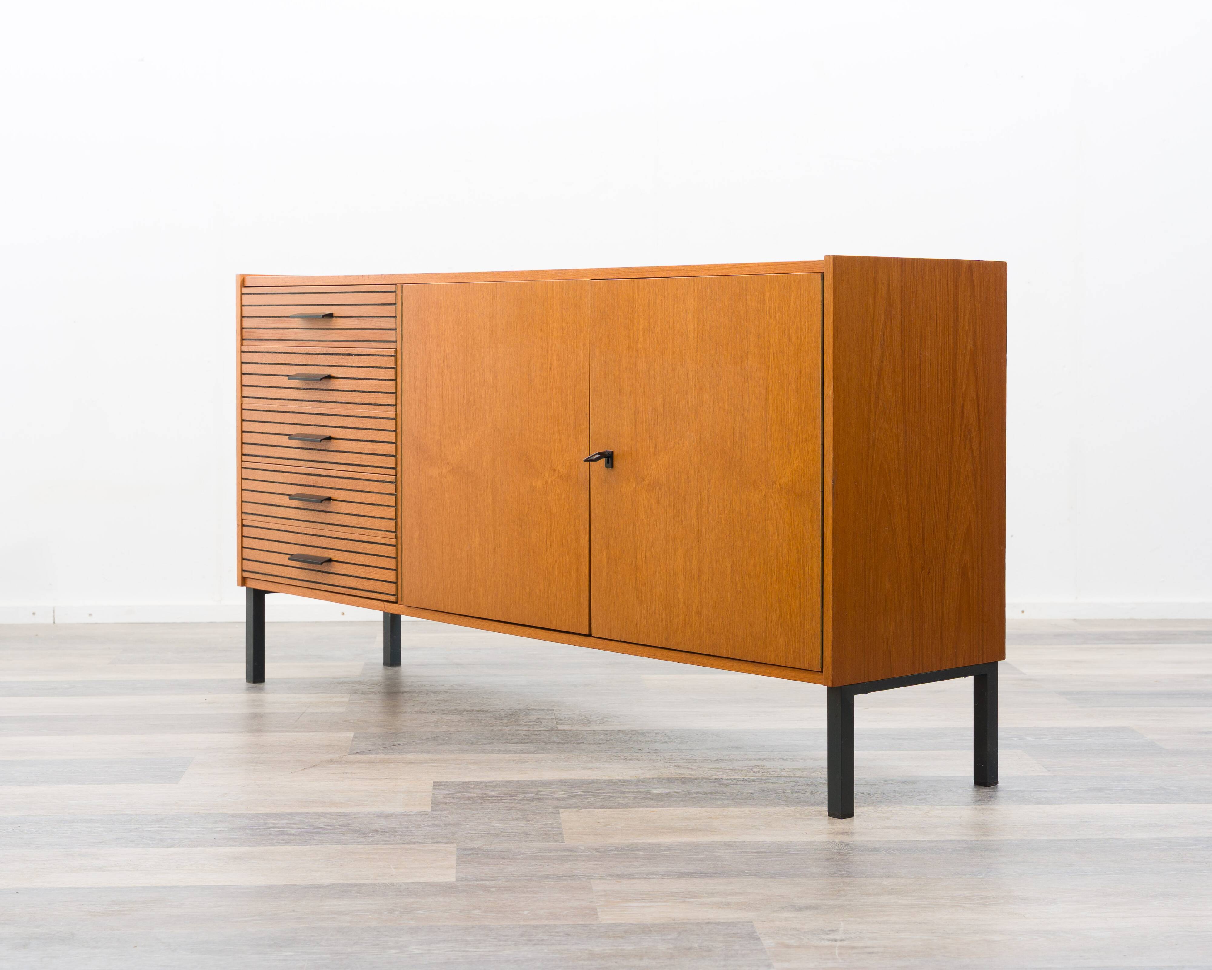 Teak sideboard with grooved drawers, 1960s.