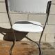 White faux leather sled chair