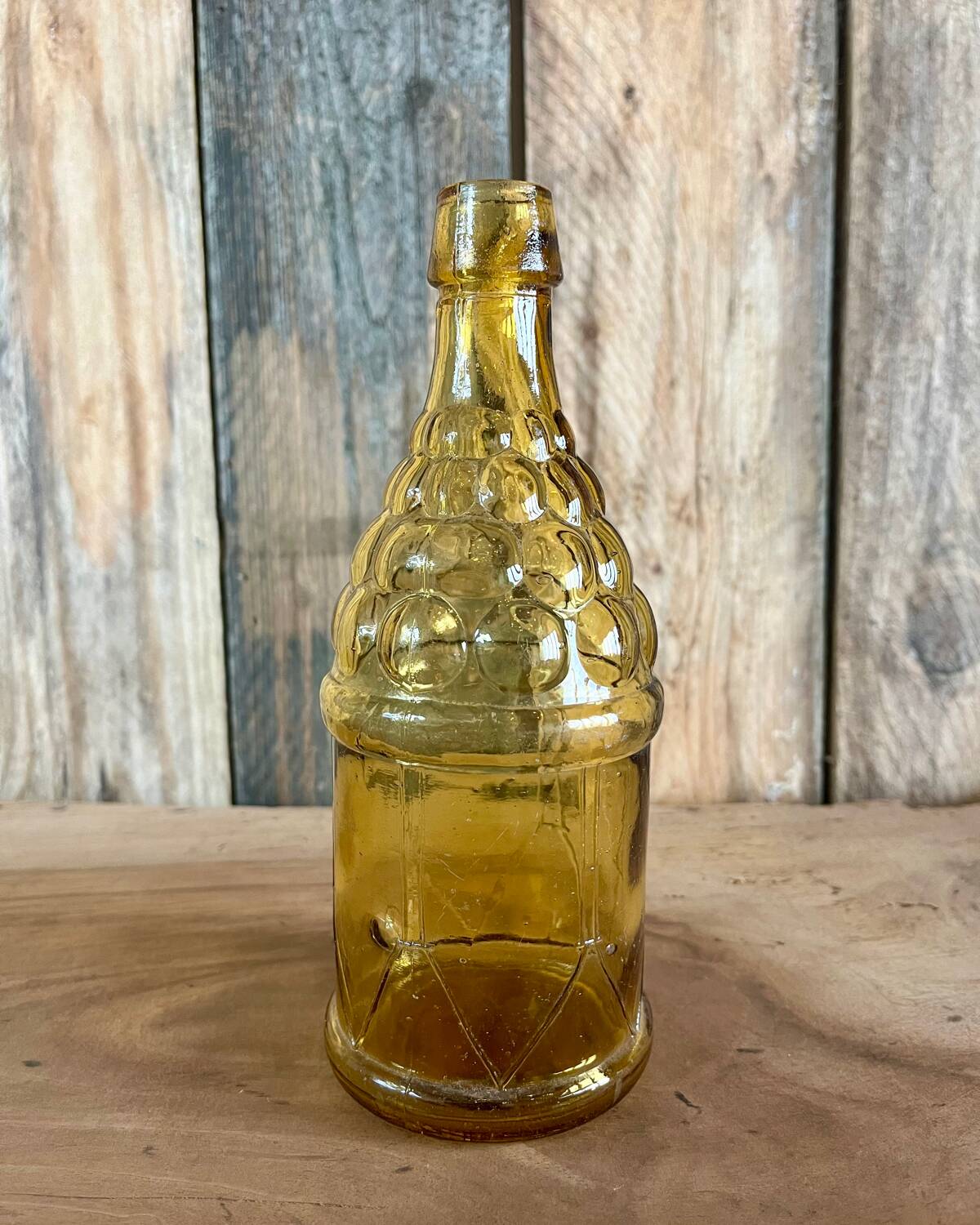 70s yellow glass bottle
