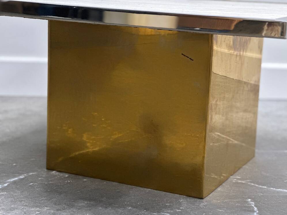 Brute travertine coffee table with brass base and chrome edges, France 1970s.