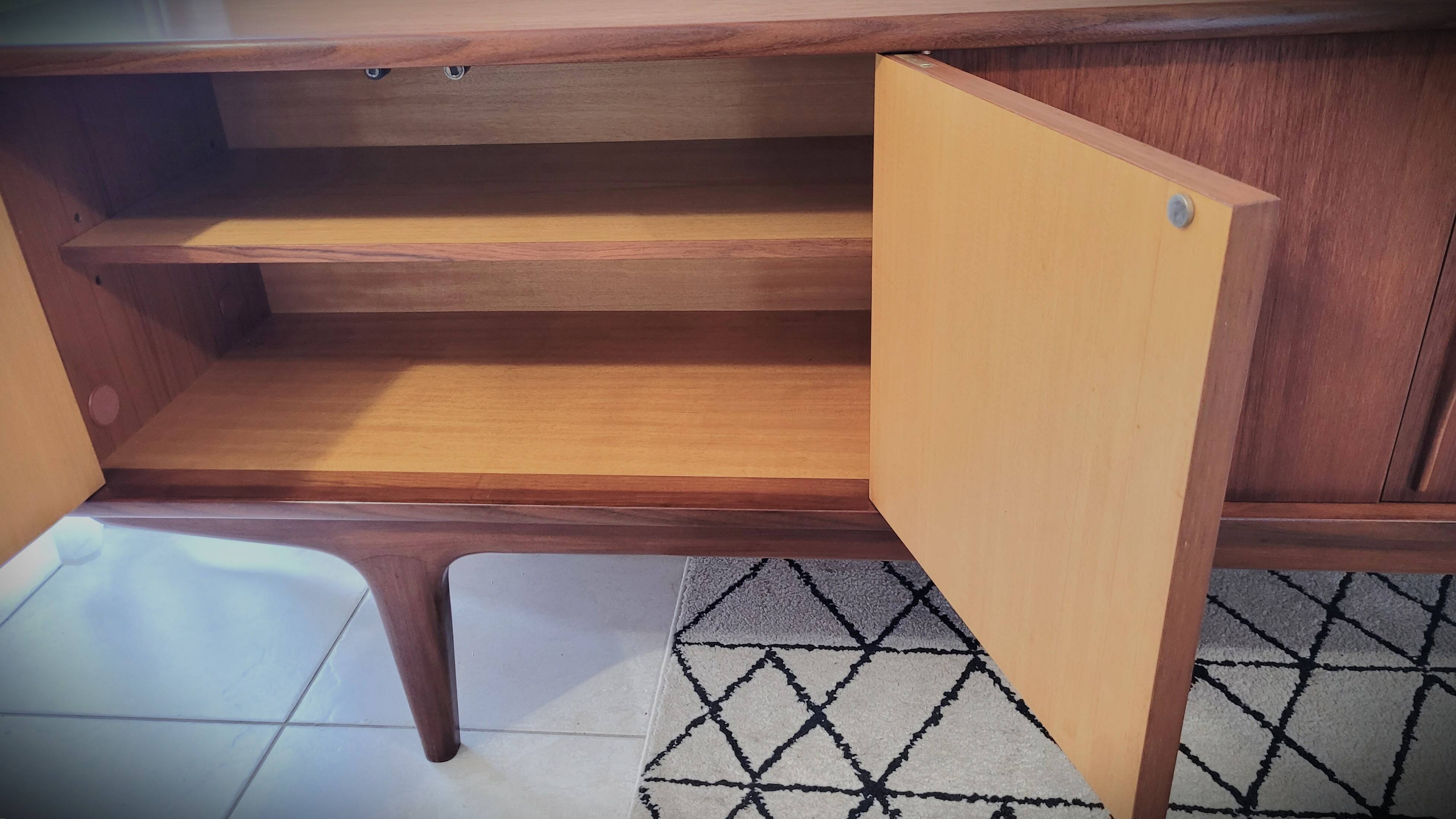 Scandinavian enfilade design in teak from the late 1960s.