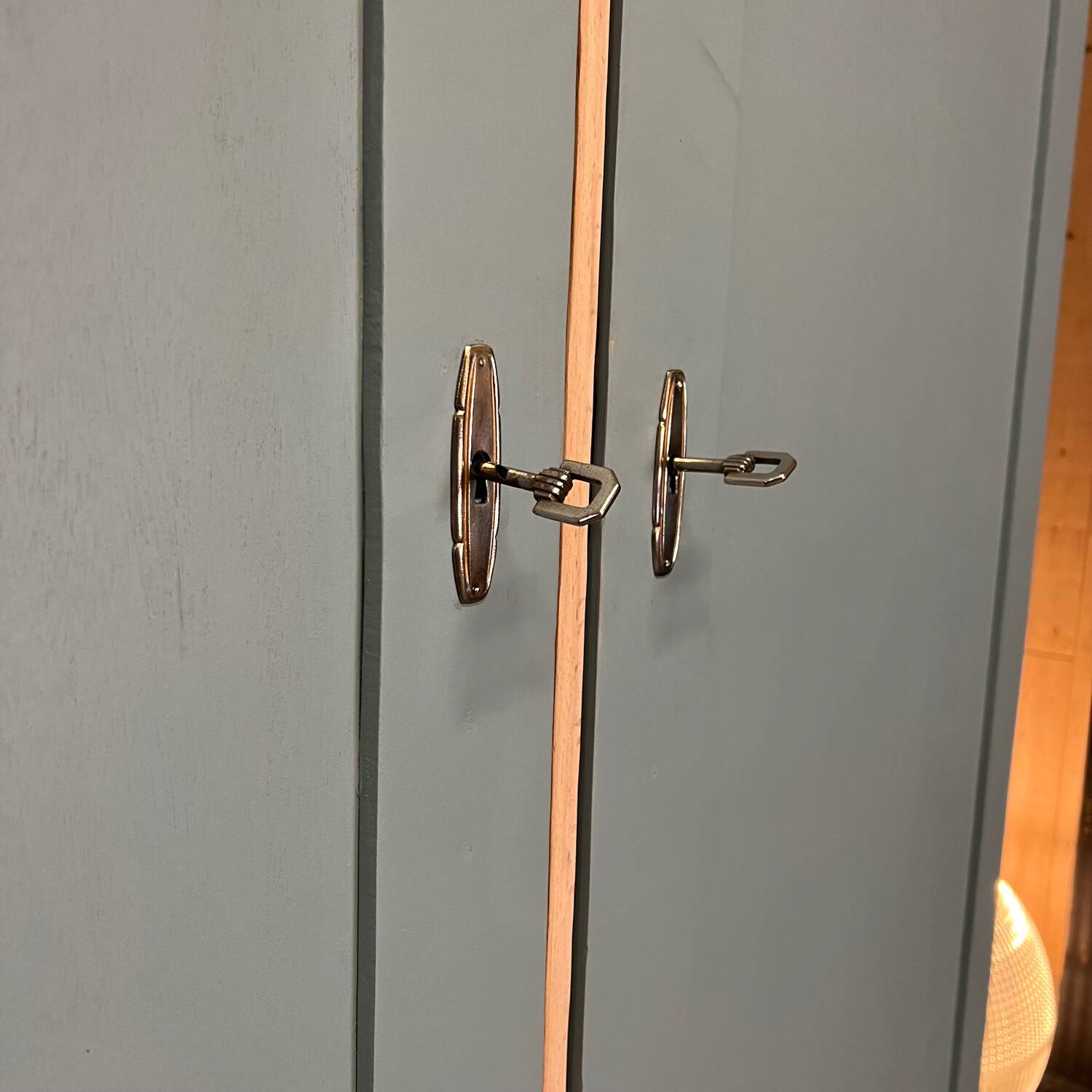 Wardrobe with two wardrobe compartments and drawers