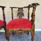 Pair of neo-Renaissance Henri II corner armchairs in carved wood, 19th century.